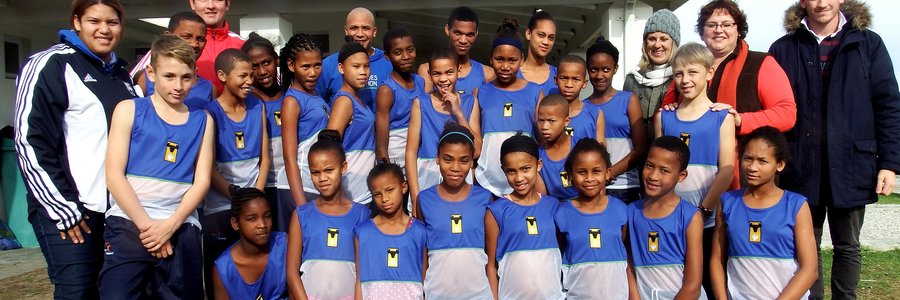 A group picture during the hand-over to the Foundationâ€™s Athletics children, with AdÃ©le Geldenhuys, Taurus General Manager 2nd from the right.  